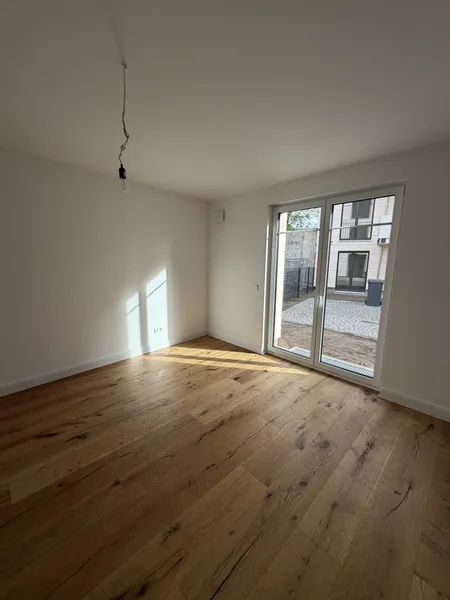Neubau Erstbezug inkl. Küche & Privatgarten — photo 1